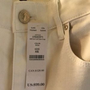 White mid rise slim crop pants with foil cuff